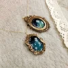 1000002799.webp Ghost in the Meadow necklaces