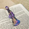 1000004669.webp Witch’s Broom – Holo Bookmark