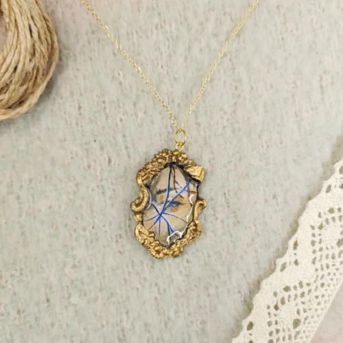 processed_699a13d6888c48cca82ccb64af75ba24.webp Broken Necklace