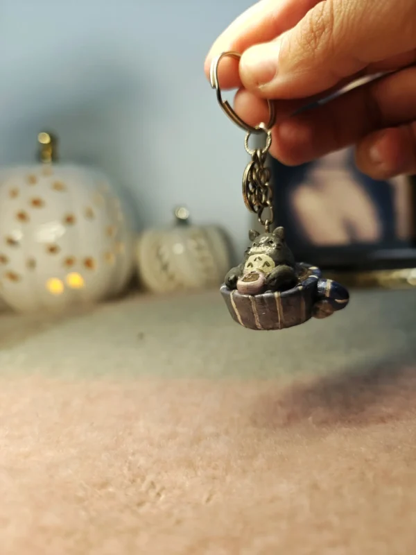 100001145628129.webp Totoro drinking tea in a teacup – Handmade Clay Keychain
