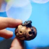 https3A2F2Fi.etsystatic.com2F113947292Fr2Fil2F0000272F51254903842Fil_fullxfull.5125490384_414c.webp Creepy Golden Pumpkins Keychains