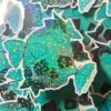 https3A2F2Fi.etsystatic.com2F113947292Fr2Fil2F2614352F38036771702Fil_fullxfull.3803677170_5gw7.webp Deathly Attraction Holographic glossy sticker