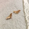 processed_7e30db0d35a8432da8736642897a2ae5.webp Bats STUD EARRINGS